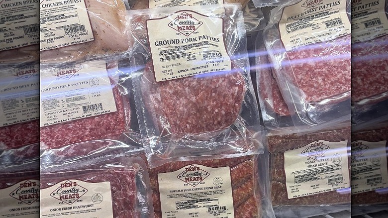 Packages of ground pork patties and sausage links from Den's Country Meats
