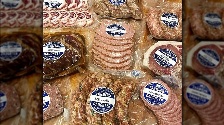 Packages of Farmer's Daughter Market and Butcher sausages and patties.