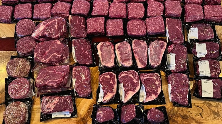 Packages of raw beef cuts.