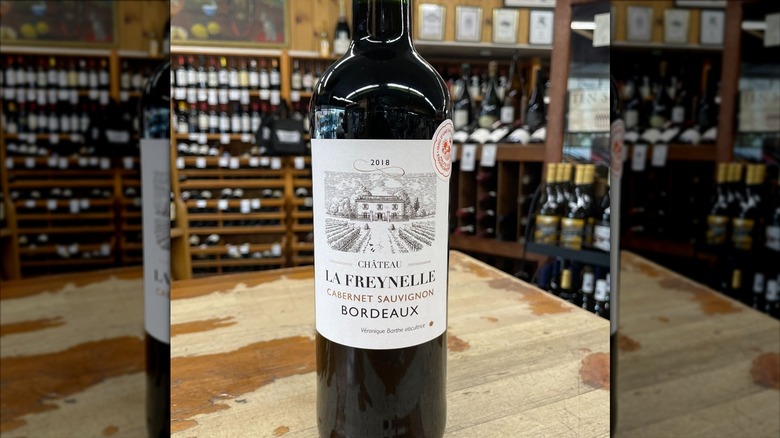 Bottle of Château La Freynelle Cabernet Sauvignon in a store