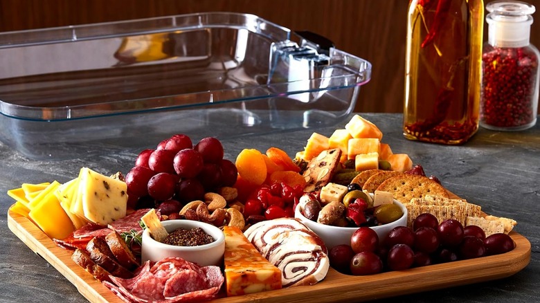 A Farberware charcuterie board with lid