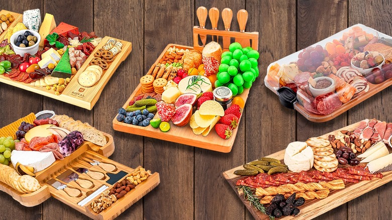 An assortment of charcuterie boards with meats, cheese, and crackers