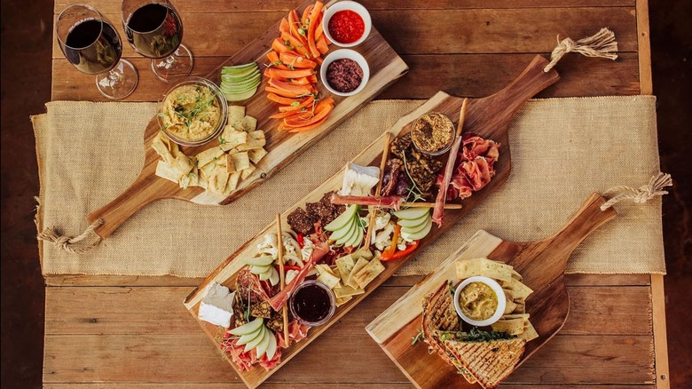 three Toscana acacia charcuterie boards
