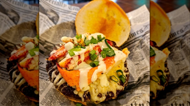 saucy burger with lobster claw