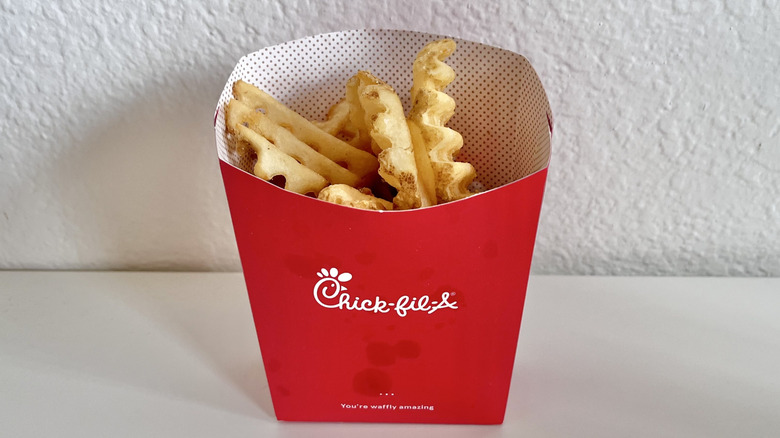 A box of Chick-fil-A fries on a table