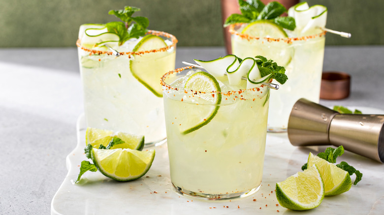 Three glasses of cucumber margaritas