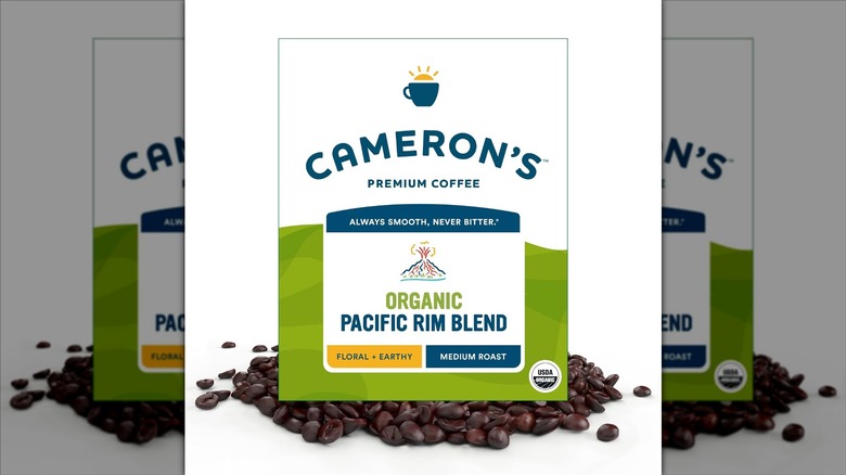 Cameron's Organic Pacific Rim Blend logo with whole coffee beans