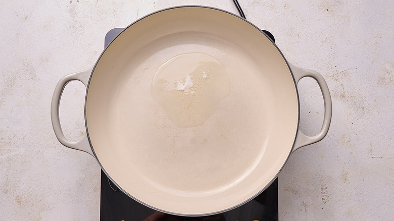 Aerial view of shortening melting in a pot