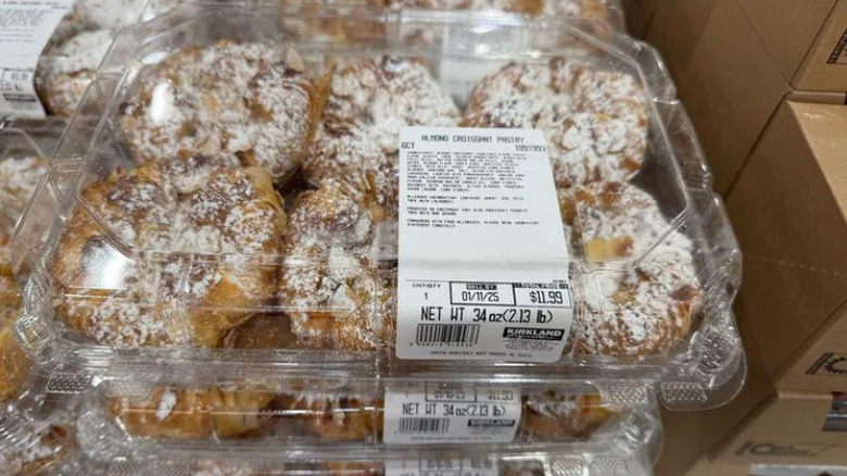 Boxes of 6 count almond croissant pastry at the Costco aisle shelf