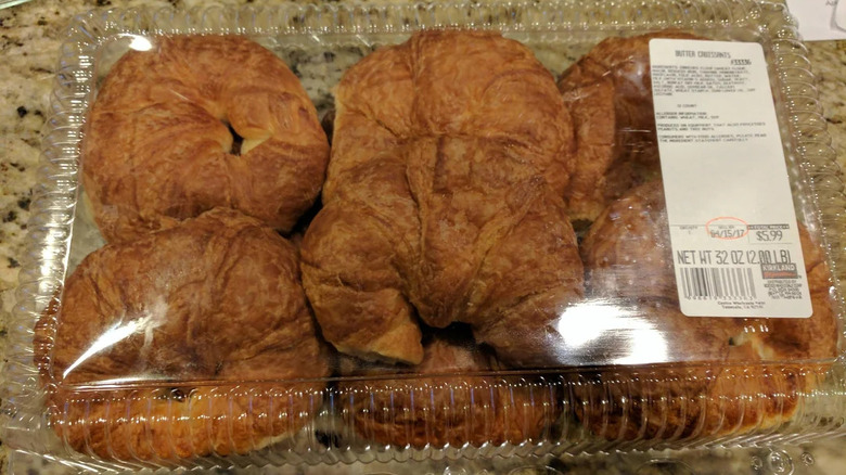 A box of 12 count original round croissants placed on a kitchen counter