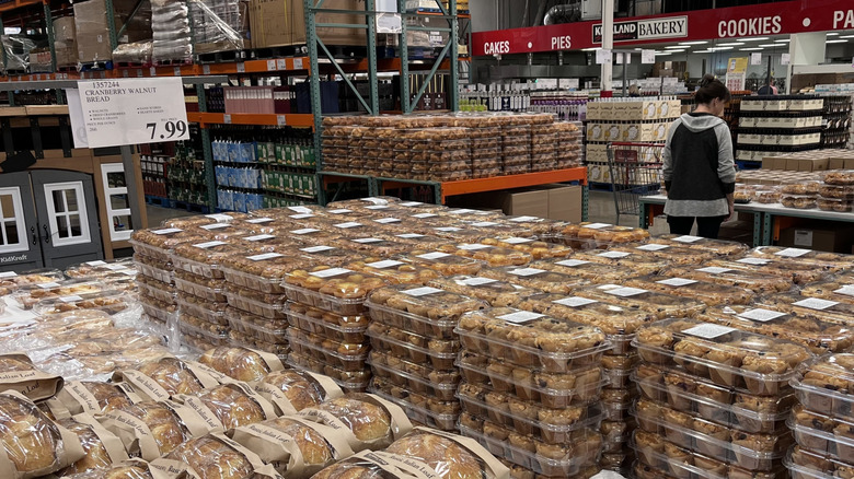 A customer shops at Costco in the bakery aisle