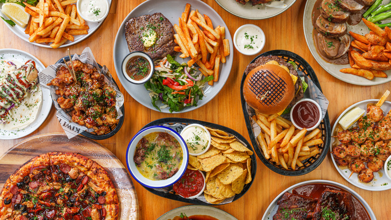 selection of prepared foods like pizza and fries