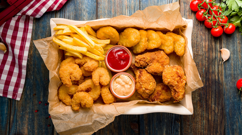 assorted fried appetizers with sauces