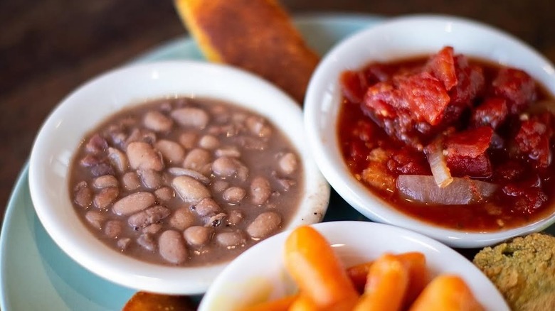 Bowls with beans and vegetables
