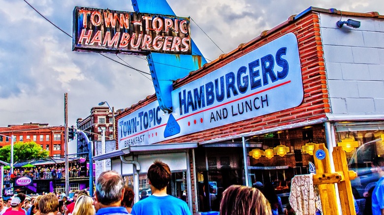 People milling outside Town Topic Hamburgers