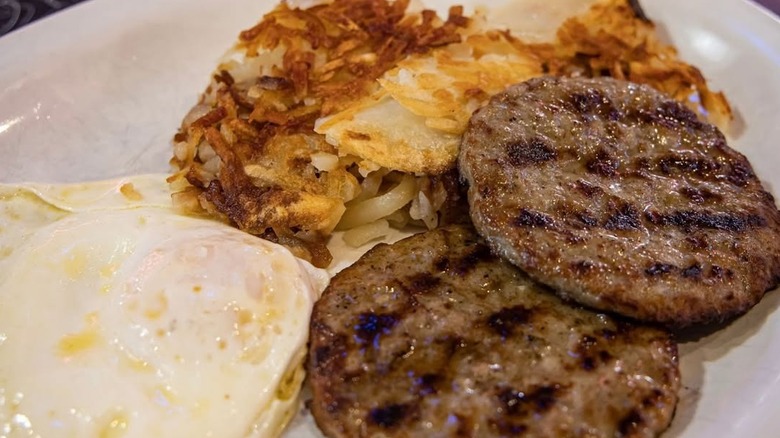 Breakfast patties with eggs and hash browns