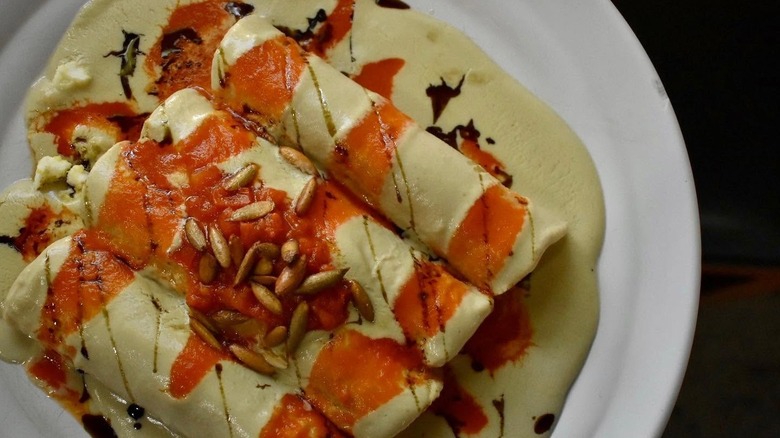 Papadzules on a white plate at Chichen Itzá Restaurant