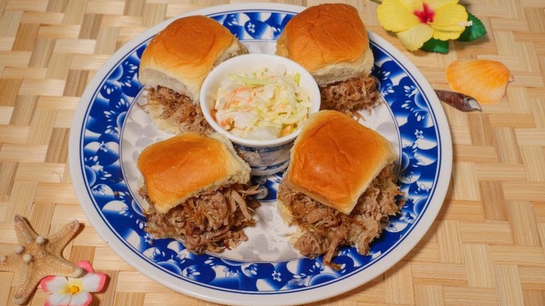 Four plated sliders and coleslaw at Rutt's Hawaiian Cafe
