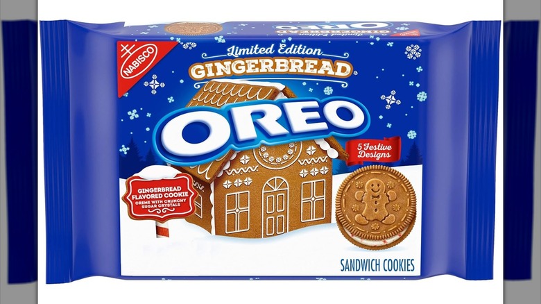 Blue pack of Gingerbread Oreos advertising five festive designs, one of which is a gingerbread man