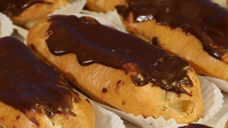 close up of an eclair with chocolate glaze on top