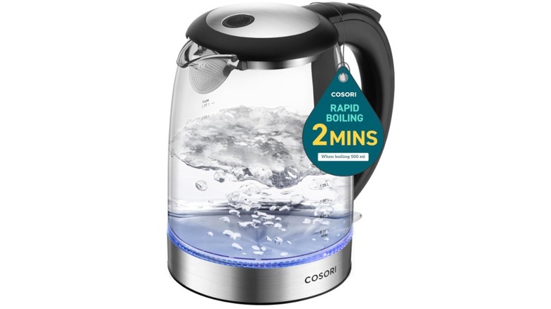 Cosori electric kettle boiling water against a white background
