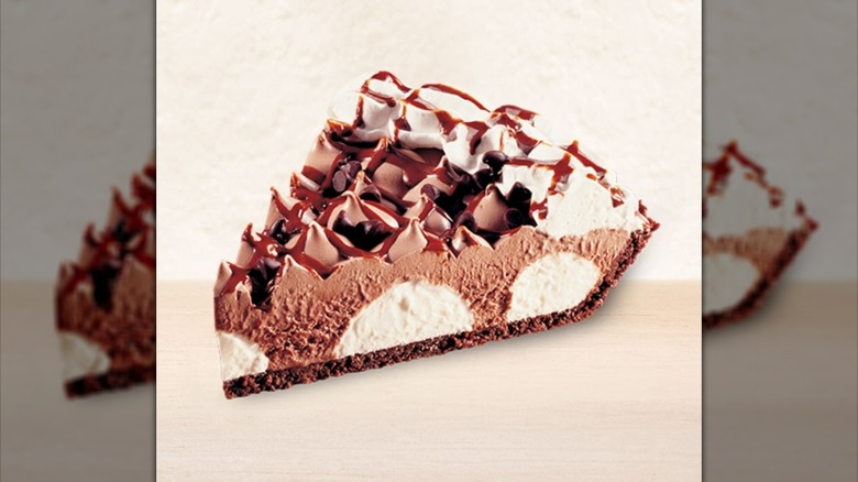 Slice of Burger King Hershey's Sundae Pie on beige background