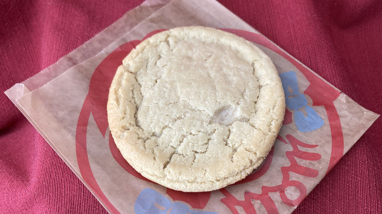 Wendy's sugar cookie on top of branded paper bag