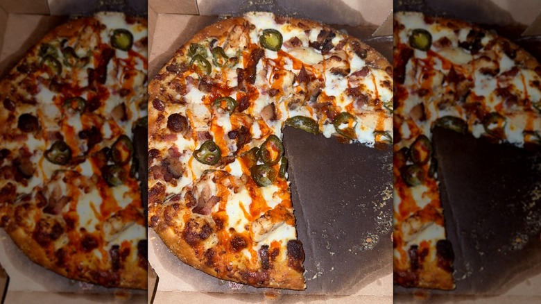 Domino's Spicy Chicken Bacon Ranch Pizza in greasy pizza box
