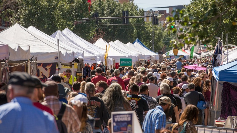 Crowds and stalls at the Pueblo Chile and Frijoles Festival