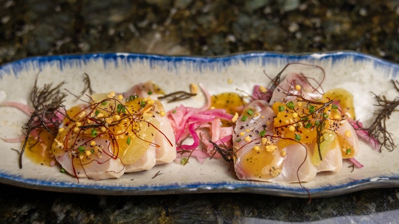 Elegantly plated fish crudo at the Hawaii Food and Wine Festival