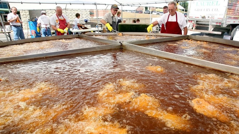 Chicken being fried in a massive container at the World Chicken Festival