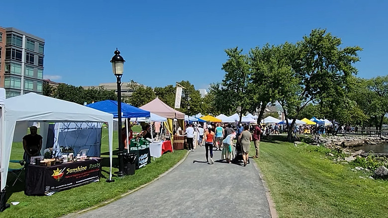 People and food stalls at the Around the World Cultural Food Festival