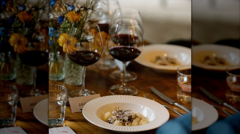 Plated gnocchi and glasses of wine at the Jackson Hole Food and Wine Festival