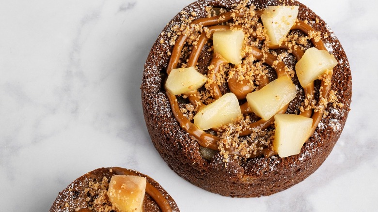 Chocolate cake with caramel and apples