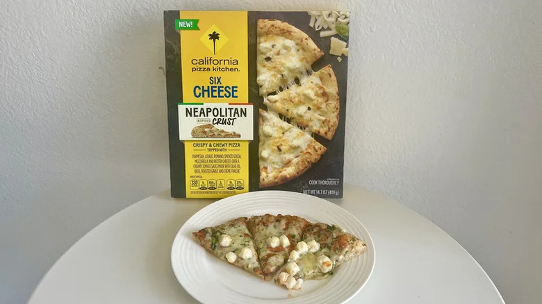 CPK six cheese Neapolitan crust pizza on a white plate