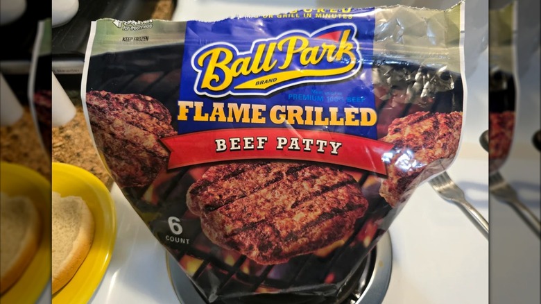 Bag of Ball Park flame grilled beef patties sitting on a countertop