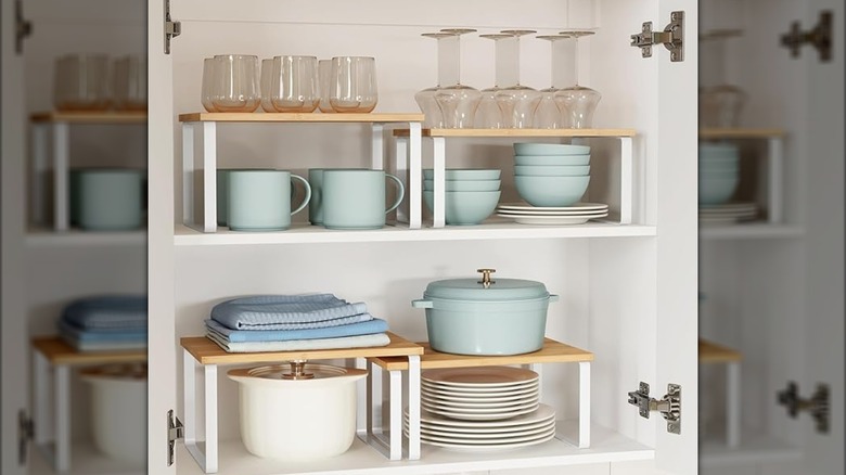 Songmics cabinet organizer shelves in a cabinet