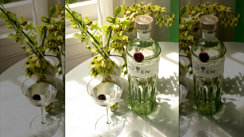 Bottle of Tanqueray No. Ten next to a cocktail
