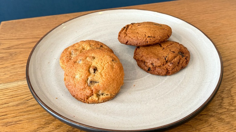 four gluten-free cookies on a plate at Noglu