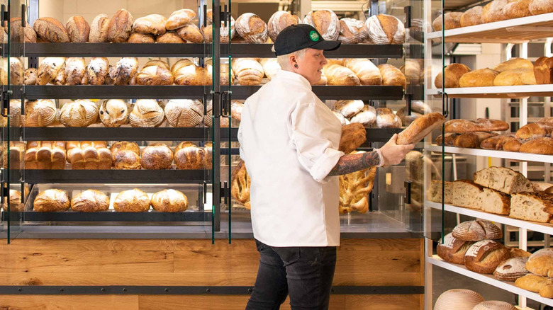a glass display case of Whole Foods' bread