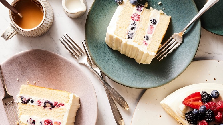 slices of the berry chantilly cake on plates