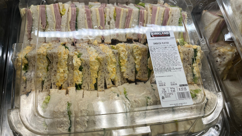 Plastic tray of various Costco sandwiches