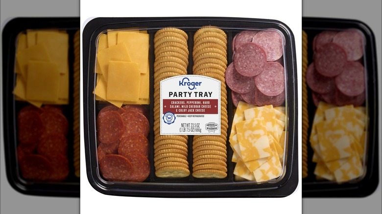 Kroger's party tray with a selection of cured meats, cheese slices, and crackers