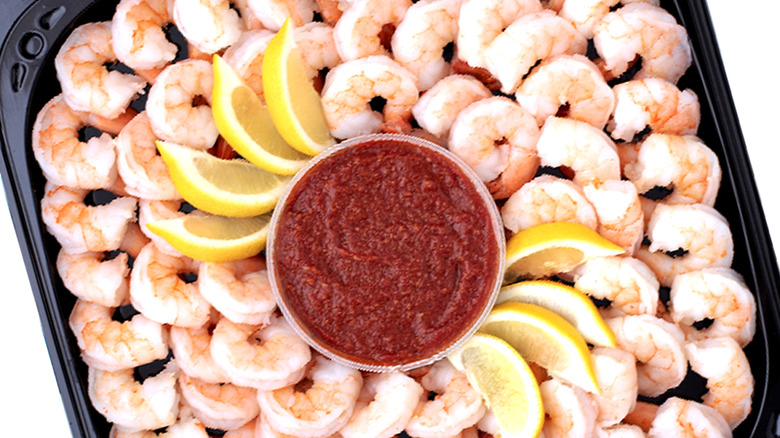 Sprouts Farmers Market's shrimp party platter with cocktail sauce and lemon wedges