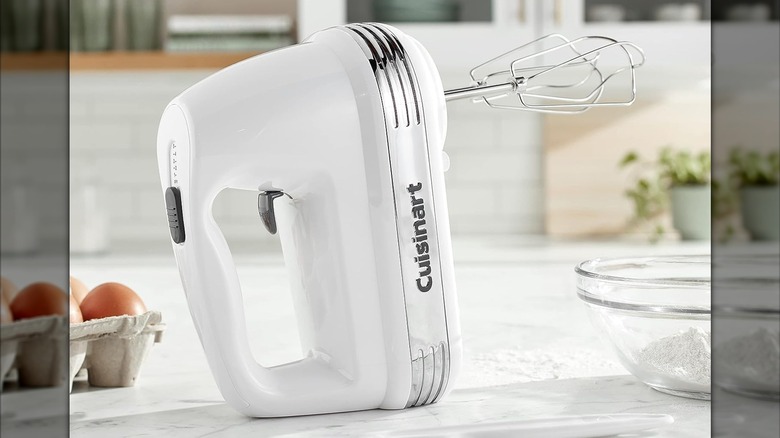 A Cuisinart hand mixer on the counter