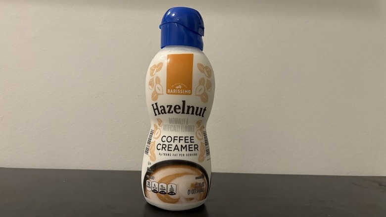 Aldi hazelnut coffee creamer on table