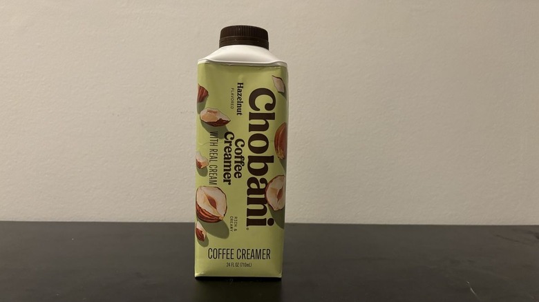 Chobani hazelnut creamer carton on table
