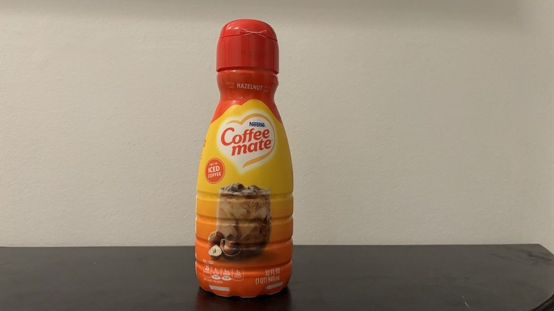 Coffee mate hazelnut liquid creamer on table