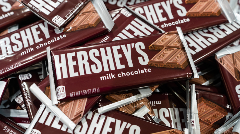 Pile of wrapped Hershey's Milk Chocolate bars