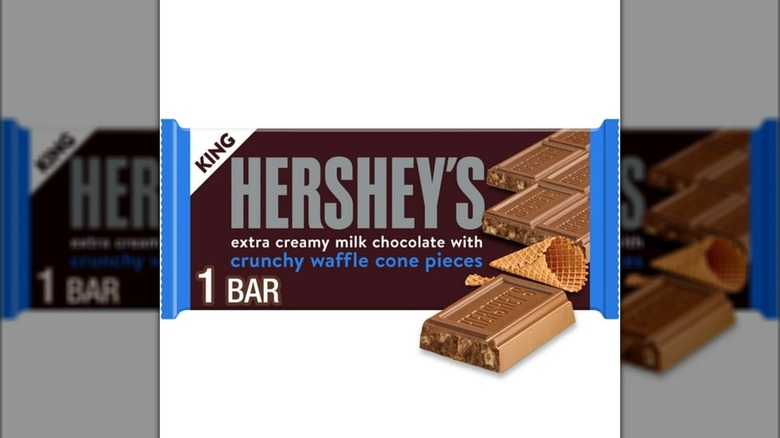 Bar of Milk Chocolate with Crunchy Waffle Cone Pieces on a white background